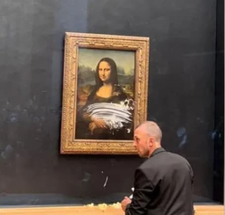 Tortazo a la Mona Lisa al grito de “¡Piensen en la Tierra!”